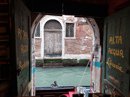 Libreria Acqua Alta gondola Venice Italy